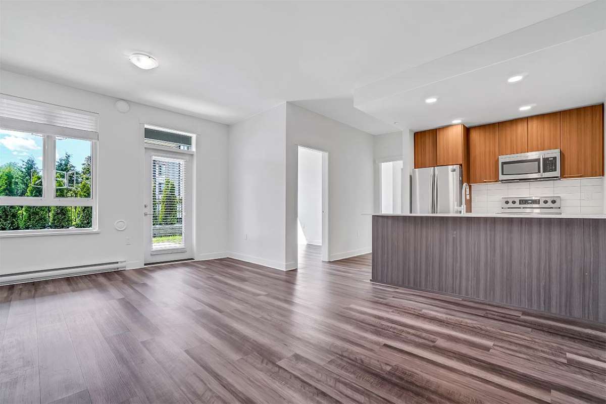 https://www.capreit.ca/wp-content/uploads/2021/09/Apartments-for-rent-in-Langley-BC-The-Point-5393-201st-St_Kitchen-Dining.jpg