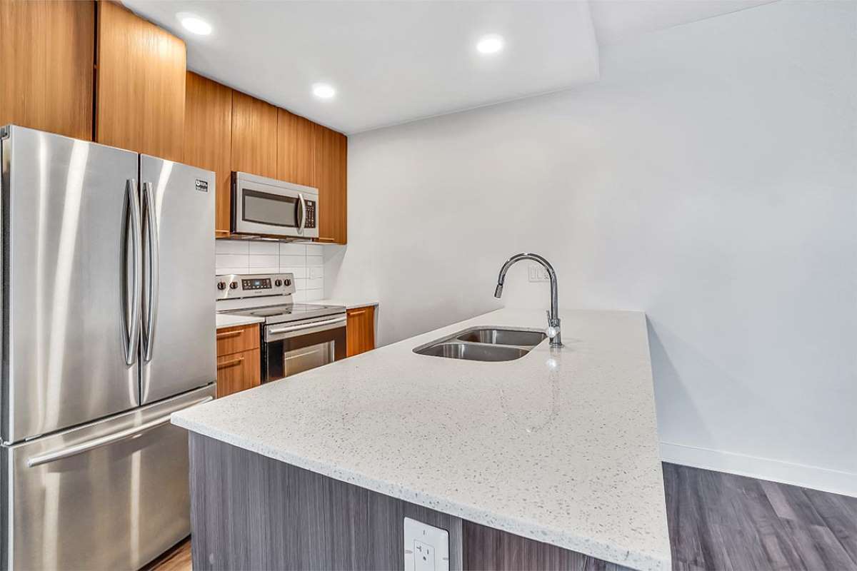 https://www.capreit.ca/wp-content/uploads/2021/09/Apartments-for-rent-in-Langley-BC-The-Point-5393-201st-St_Kitchen.jpg