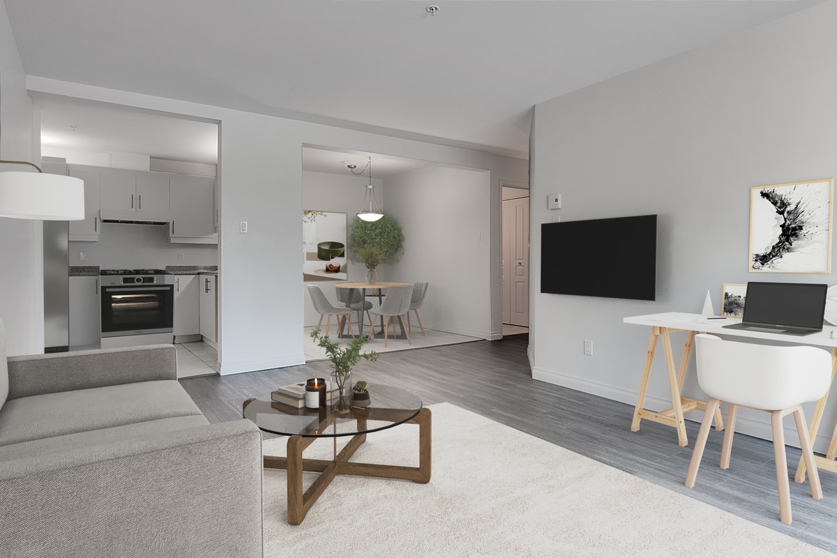 https://www.capreit.ca/wp-content/uploads/2021/09/Faubourg-de-la-Pointe-QC-Living-Room-Kitchen_VS.jpg