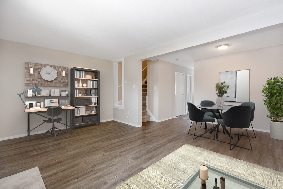 https://www.capreit.ca/wp-content/uploads/2021/09/Hunters-and-Surrey-Townhomes-Ottawa-ON-Living-Room.jpg