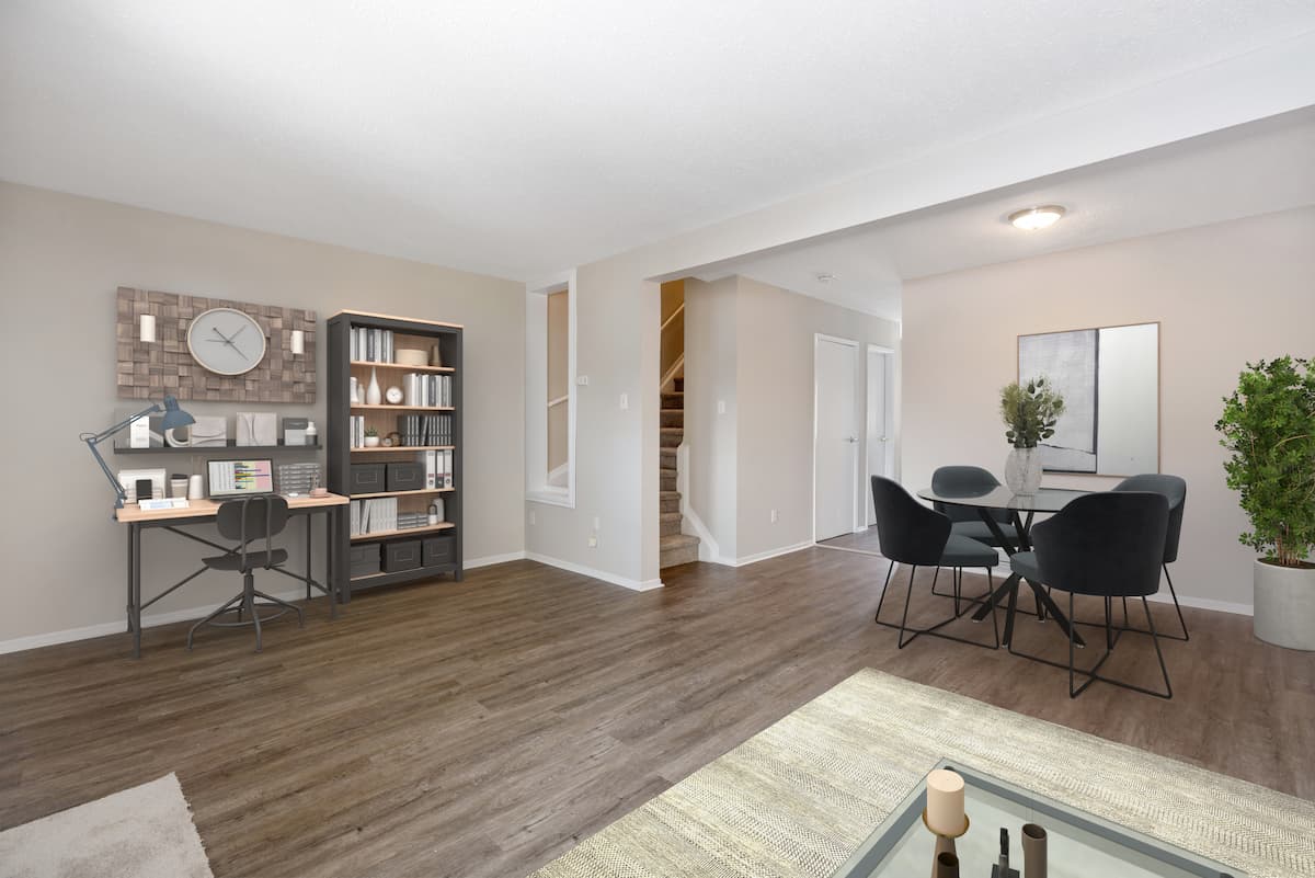 https://www.capreit.ca/wp-content/uploads/2022/04/Hunters-and-Surrey-Townhomes-Ottawa-ON-Living-Room.jpg