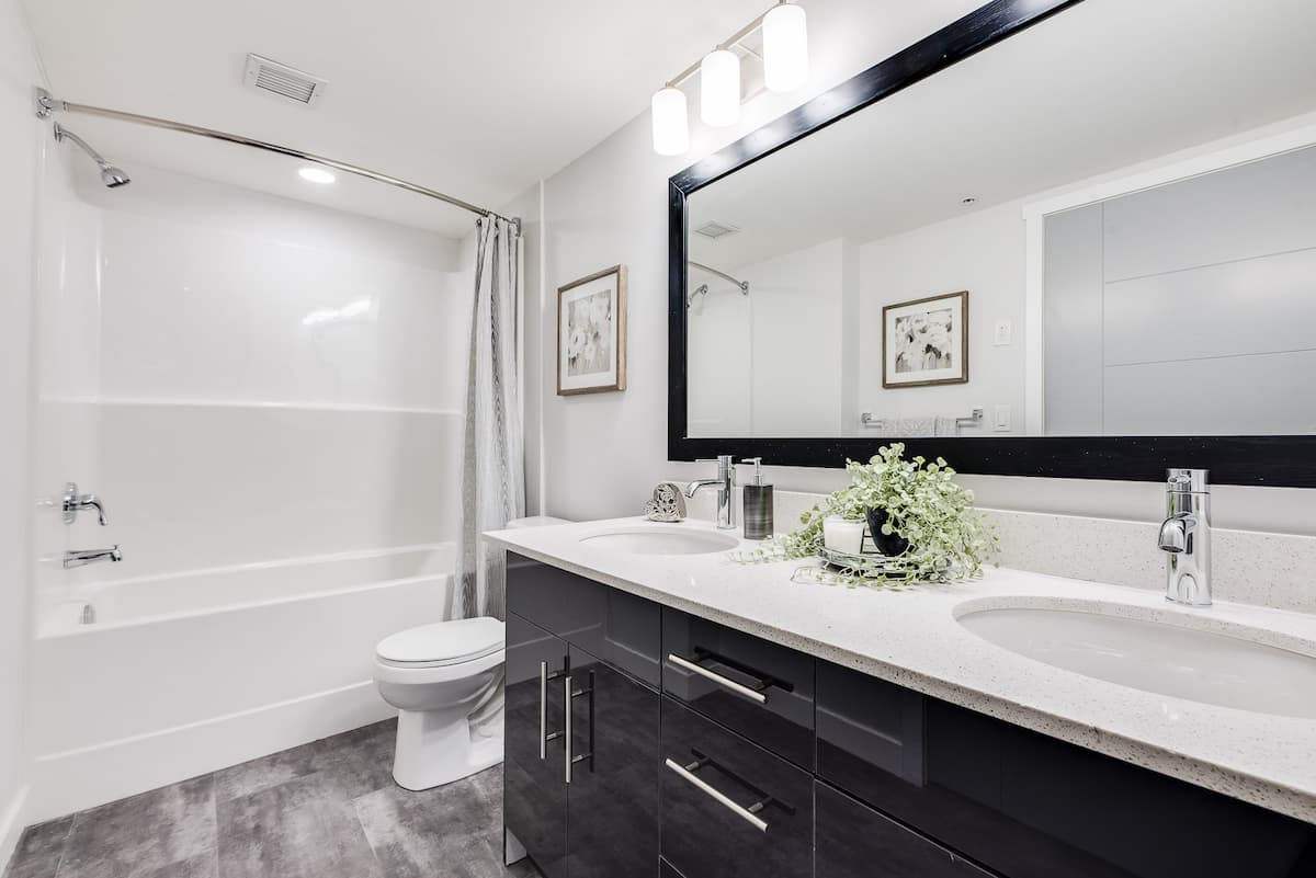 https://www.capreit.ca/wp-content/uploads/2023/02/ON_Eagle-Pointe_Interior_Display-Suite_Low-Rez_Bathroom-2-1.jpg