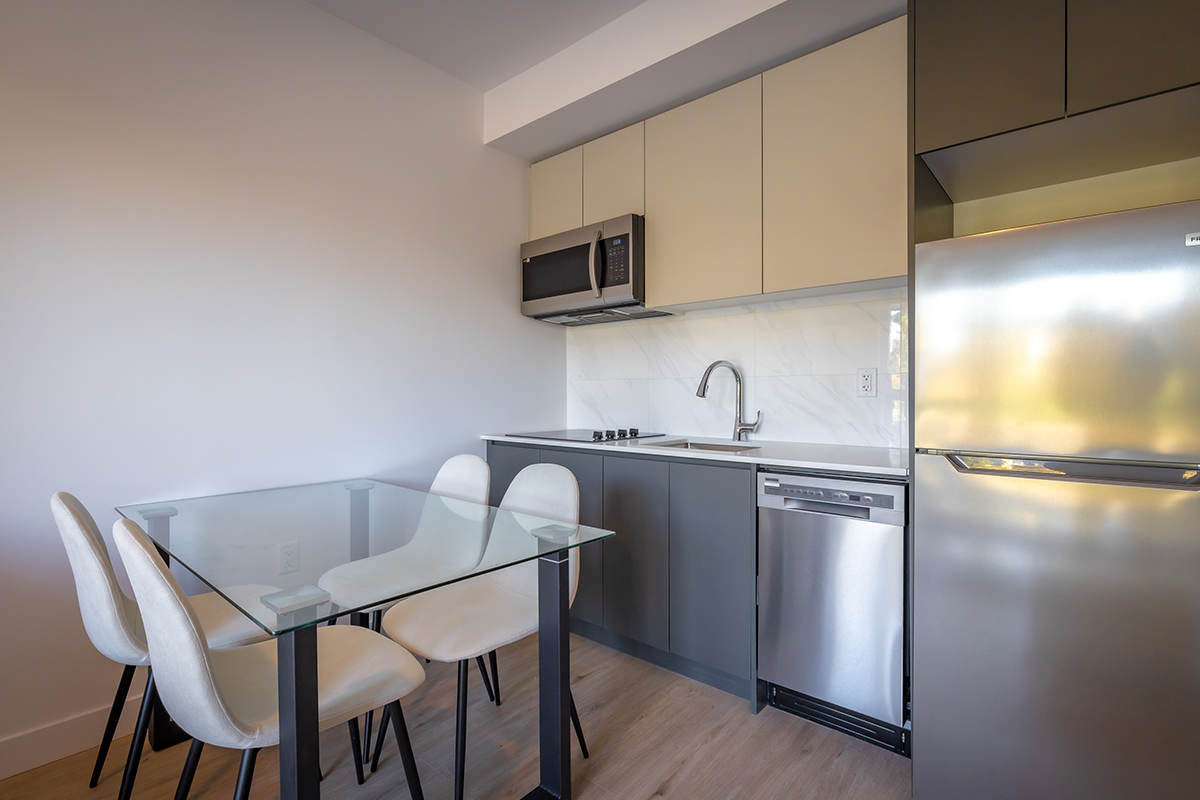 https://www.capreit.ca/wp-content/uploads/2024/07/Axir-Vancouver_0004_2024_0061-2590-Lonsdale-Avenue-Suite-Showroom-3.png